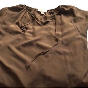 Micheal Kors size Medium brownish green silky top runs large like new